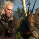 Geralt and Vesemir in their video game appearances for The Witcher 3: The Wild Hunt, crouching in some tall grass in front of trees..